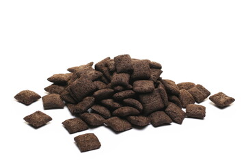 Cereal flakes in form of pillows, with vanilla flavor, pile isolated on white