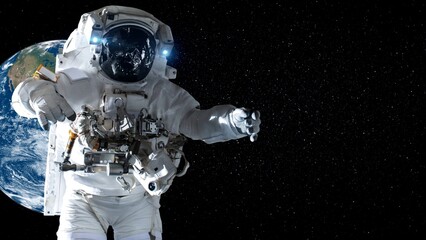 Astronaut spaceman do spacewalk while working for spaceflight mission at space station . Astronaut wear full spacesuit for operation . Elements of this image furnished by NASA space astronaut photos . © InfiniteFlow
