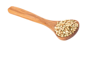Raw buckwheat and wooden spoon on white background.