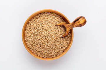 Bio natural sesame seeds on wooden bowl. - 486763196
