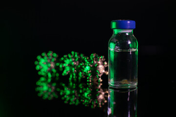 Glass jars with antibodies. A powerful angry virus with a face. The coronavirus is slightly blurred.