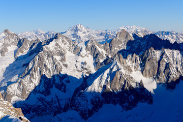 Le Grand Combin and Mont Cervin in Europe, France, Rhone Alpes, Savoie, Alps, in winter on a sunny day.
