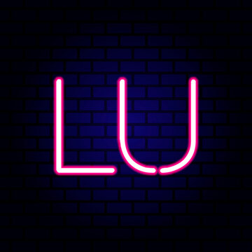 Neon word I Love You on brick wall background.