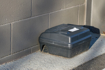 Pest control bate station to help get rid of rats using bait poison that is protected from the...