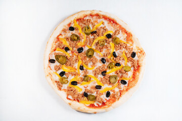 Colorful pizza with cucumbers jalapeno peppers and olives.