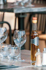 restaurant table set up with dishes outdoors