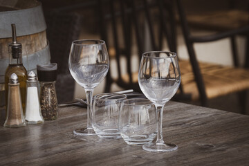 restaurant table set up with dishes outdoors