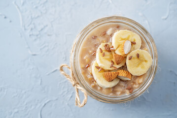 Banana flax seeds overnight oats with banana slices and almonds