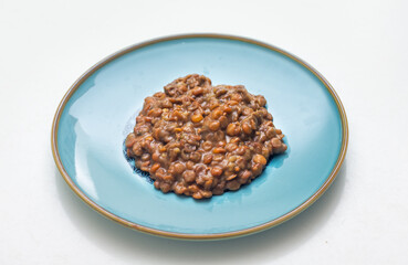 Lentils portion served on a dish.