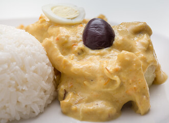 Peruvian food: Aji de Gallina, treditional recipe with chicken meat and pepper sauce.