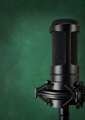 condenser microphone on green background