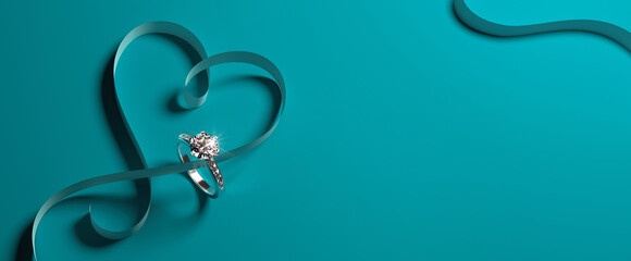 A white gold engagement ring with diamonds and a heart-shaped ribbon on a turquoise (tiffany blue) background. Romantic wedding jewelry background. 
