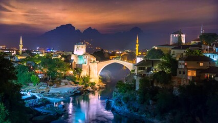 Mostar Bosnia and Herzegovina old town view at night time lapse, mostar skyline aerial view.