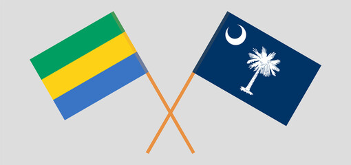 Crossed flags of Gabon and The State of South Carolina. Official colors. Correct proportion