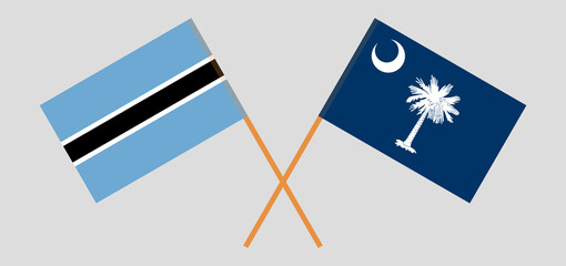 Crossed flags of Botswana and The State of South Carolina. Official colors. Correct proportion