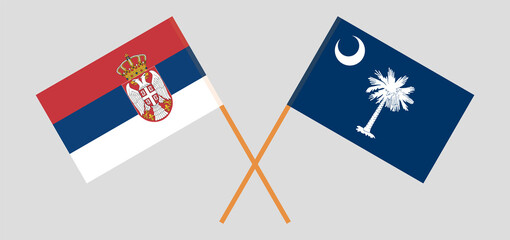 Crossed flags of Serbia and The State of South Carolina. Official colors. Correct proportion