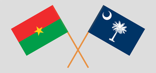 Crossed flags of Burkina Faso and The State of South Carolina. Official colors. Correct proportion