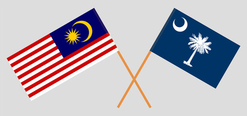 Crossed flags of Malaysia and The State of South Carolina. Official colors. Correct proportion