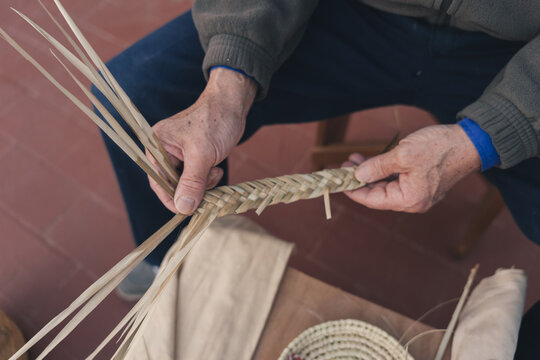 close photo of a craftsman showing his work.