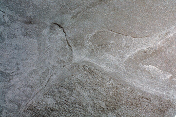 texture and structure of stone, rock, concrete, marble, universal wallpaper, background for projects in shades of gray