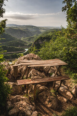 Wooden bench and table on a lookout point above the canyon of the river Uvac in southwestern Serbia