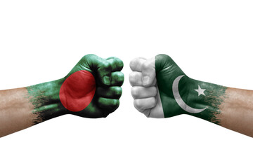 Two hands punch to each others on white background. Country flags painted fists, conflict crisis concept between bangladesh and pakistan