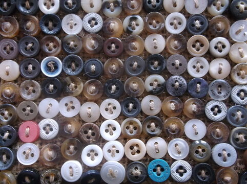 Colorful Small Button Collection Sewn onto Burlap