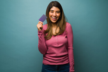 Fototapeta premium Latin woman got a new credit card