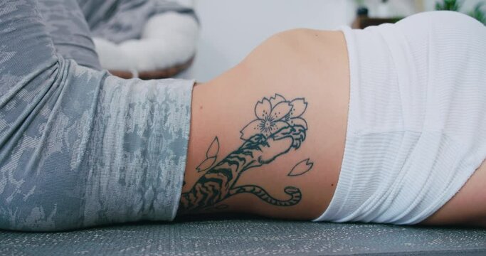 Woman with fit body showing stomach vacuum, yoga breathing exercise, close up