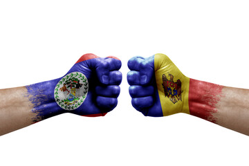 Two hands punch to each others on white background. Country flags painted fists, conflict crisis concept between belize and moldova