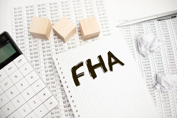 Businessman Writing FHA Concepts on his Note