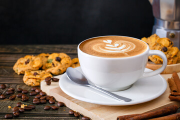 Cappuccino cup, Cappuccino coffee in a beautiful glass on the table favorite cup of coffee concept.