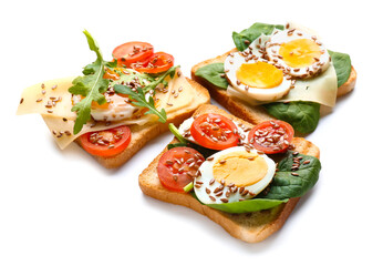 Tasty toasts with eggs and flax seeds on white background