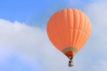 A bright balloon rose into the cloudy sky. Space for your text