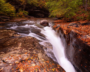 waterfall in autumn forest
