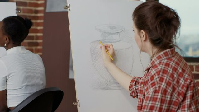 Future artist drawing inspiration model to create sketch in art class program, learning new skills for personal development. Artistic creation on canvas in educational classroom.