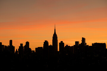 Fototapeta na wymiar Sunset Clouds Over the Manhattan Skyline