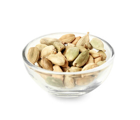 Bowl of cardamom seeds on white background
