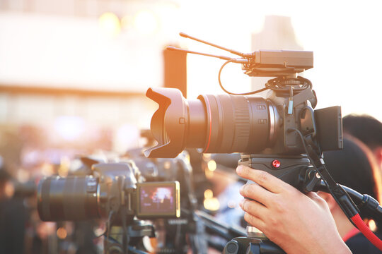 media photographer with entertainment reporters Interviewing celebrities and actors at a fashion show