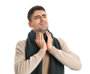 Ill young man with sore throat on white background