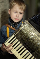 child playing accordion