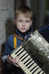 child playing accordion
