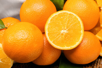 Fresh ripe oranges on table
