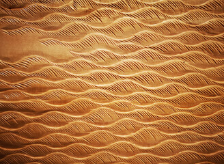 Carved water ripple pattern in wood