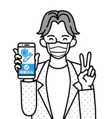 ピースサインと笑顔でワクチン接種証明の画面を表示したスマホを持つ若い男性 - マスク着用