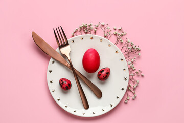 Stylish Easter table setting on pink background