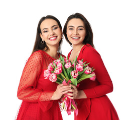 Beautiful young women with flowers on white background. International Women's Day celebration