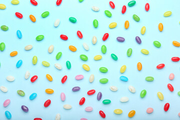Different jelly beans on blue background