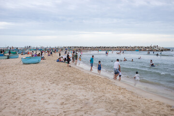 Scenic view of the sea. Beach activities, holidays, weekends on the beach, lots of people. Asian beach. High quality photo
