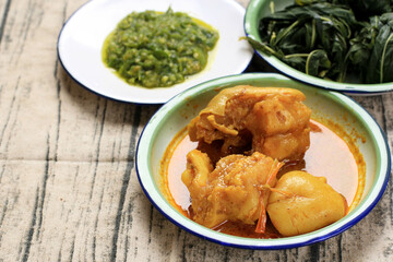 Gulai Tunjang, Beef Tendon Stewed in Coconut Sauce, West Sumatera Food (Nasi Padang)